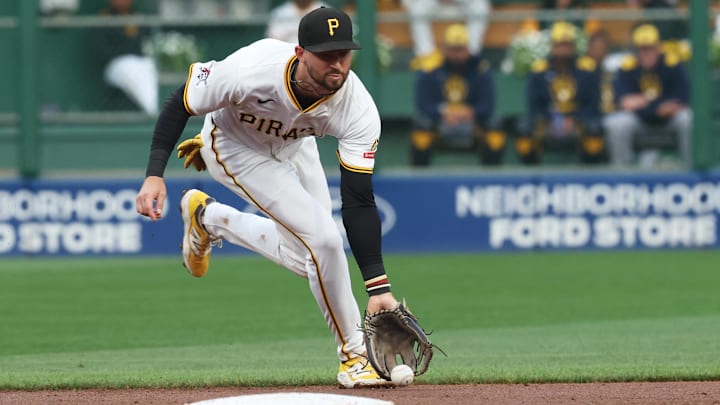 Sep 6, 2025; Pittsburgh, Pennsylvania, USA;  Pittsburgh Pirates shortstop Jared Triolo (19)fields a ground ball for an out against Milwaukee Brewers shortstop Joey Ortiz (not pictured) during the third inning at PNC Park. Mandatory Credit: Charles LeClaire-Imagn Images