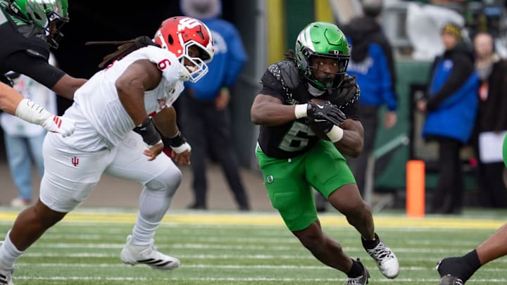 Oregon running back Noah Whittington carries the ball as the Oregon Ducks host the Indiana Hoosiers Oct. 11, 2025, at Autzen Stadium in Eugene, Oregon.