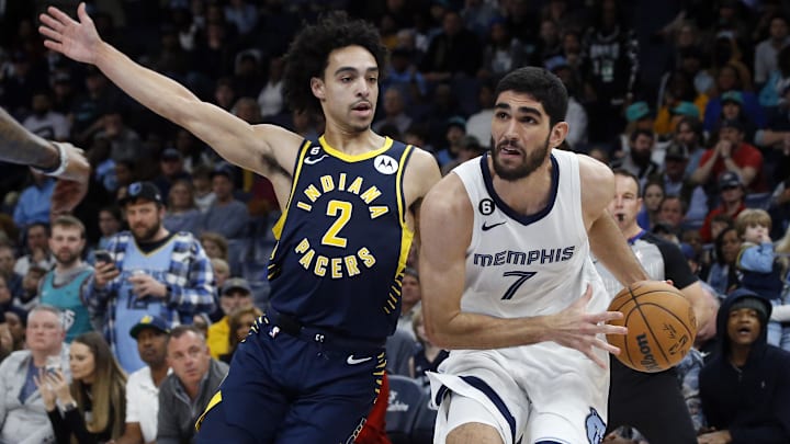 Jan 29, 2023; Memphis, Tennessee, USA; Memphis Grizzlies forward Santi Aldama (7) drives to the basket as Indiana Pacers guard Andrew Nembhard (2) defends during the second half at FedExForum. Mandatory Credit: Petre Thomas-Imagn Images