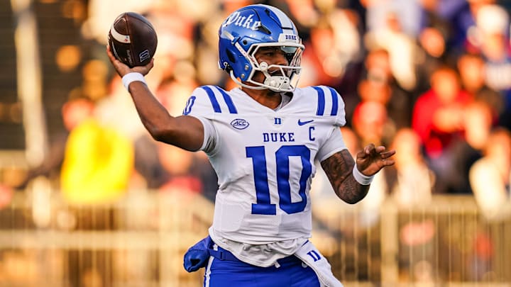 Nov 8, 2025; East Hartford, Connecticut, USA; Duke Blue Devils quarterback Darian Mensah (10) throws a pass against the UConn Huskies in the first quarter at Pratt & Whitney Stadium at Rentschler Field. Mandatory Credit: David Butler II-Imagn Images