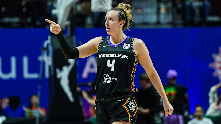 Oct 6, 2024; Uncasville, Connecticut, USA; Connecticut Sun guard Marina Mabrey (4) reacts after her basket against the Minnesota Lynx in the second half during game four of the 2024 WNBA Semi-finals at Mohegan Sun Arena. Mandatory Credit: David Butler II-Imagn Images