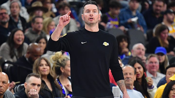 Los Angeles Lakers head coach JJ Redick watches game action against the Los Angeles Clippers during the first half at Intuit Dome.