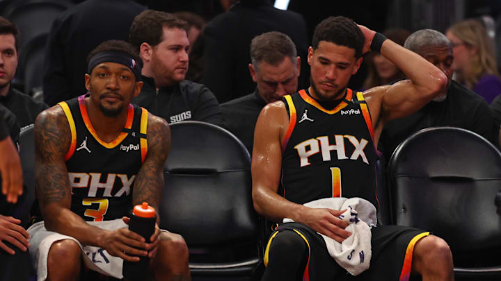 Apr 9, 2025; Phoenix, Arizona, USA; Phoenix Suns guard Bradley Beal (3) and guard Devin Booker (1) react on the bench against the Oklahoma City Thunder during the second half at Footprint Center. Mandatory Credit: Mark J. Rebilas-Imagn Images Apr 9, 2025; Phoenix, Arizona, USA; Phoenix Suns guard Bradley Beal (3) and guard Devin Booker (1) react on the bench against the Oklahoma City Thunder during the second half at Footprint Center. Mandatory Credit: Mark J. Rebilas-Imagn Images