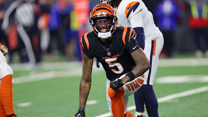 Cincinnati Bengals wide receiver Tee Higgins reacts after catching a first down pass in overtime against the Denver Broncos.