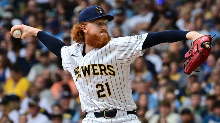 Aug 30, 2026; Milwaukee, Wisconsin, USA;  Milwaukee Brewers pitcher Dustin May (21) throws a pitch in the first inning against the Texas Rangers at American Family Field.  Mandatory Credit: Benny Sieu-Imagn Images