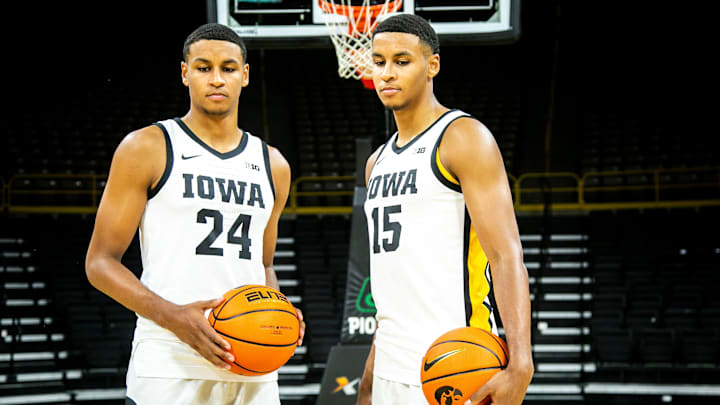 Iowa forwards Kris Murray (24) and Keegan Murray (15) pose for a photo during Hawkeyes men's basketball media day, Monday, Oct. 11, 2021, at Carver-Hawkeye Arena in Iowa City, Iowa. The two are twin brothers. Iowa forwards Kris Murray (24) and Keegan Murray (15) pose for a photo during Hawkeyes men's basketball media day, Monday, Oct. 11, 2021, at Carver-Hawkeye Arena in Iowa City, Iowa. The two are twin brothers.