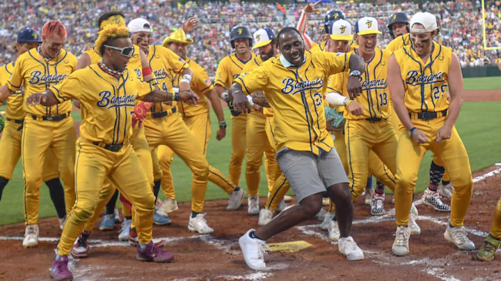 Clemson Hall of Fame running back and current running back coach CJ Spiller dances with the Savannah Bananas.
