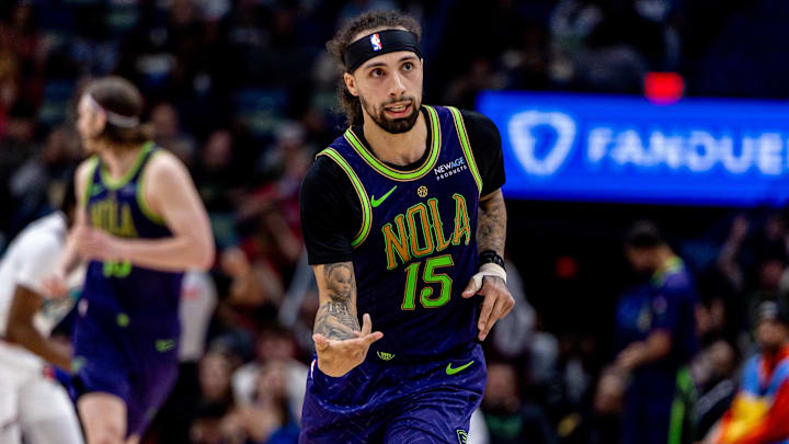 Mar 9, 2025; New Orleans, Louisiana, USA;  New Orleans Pelicans guard Jose Alvarado (15) reacts after making a three point basket against the Memphis Grizzlies during the second half at Smoothie King Center. Mandatory Credit: Stephen Lew-Imagn Images