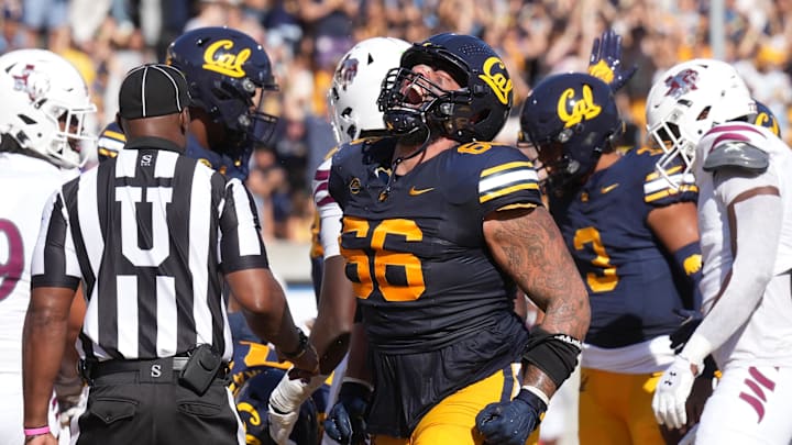 Cal guard Jordan Spasojevic-Moko (66) celebrates a Cal touchdown