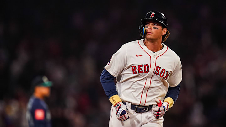 Apr 22, 2025; Boston, Massachusetts, USA; Boston Red Sox first base Triston Casas (36) hits a three run home run against the Seattle Mariners in the seventh inning at Fenway Park. Mandatory Credit: David Butler II-Imagn Images