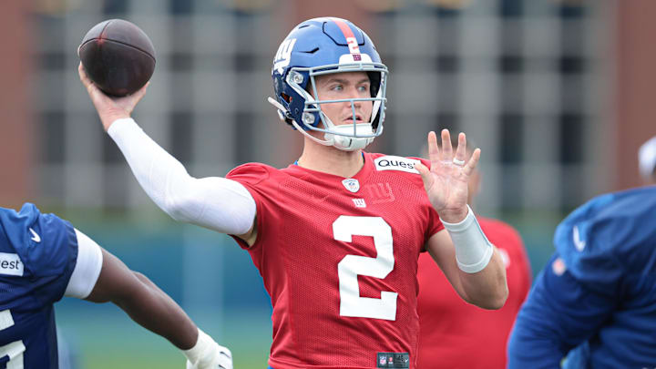 Jul 24, 2024; East Rutherford, NJ, USA; New York Giants quarterback Drew Lock (2) drops back to pass during training camp at Quest Diagnostics Training Facility. Mandatory Credit: Vincent Carchietta-USA TODAY Sports