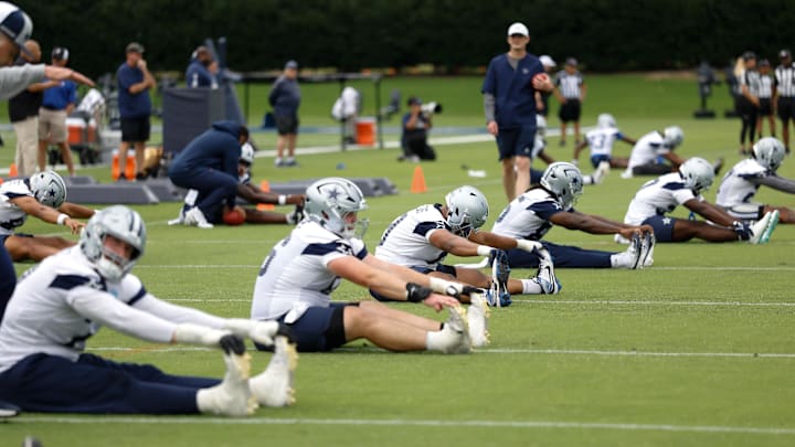 The Dallas Cowboys go through drills at the Ford Center at the Star Training Facility in Frisco, Texas.