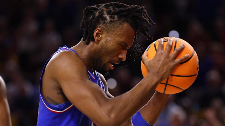 Mar 3, 2026; Tempe, Arizona, USA; Kansas Jayhawks guard Darryn Peterson (22) reacts against the Arizona State Sun Devils in the second half at Desert Financial Arena. Mandatory Credit: Mark J. Rebilas-Imagn Images