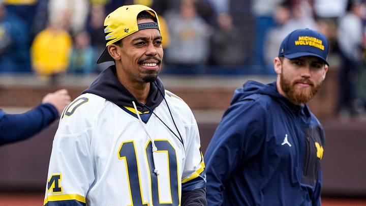 Michigan wide receivers coach Micah Simon watches warm up during the spring game at Michigan Stadium in Ann Arbor on Saturday, April 18, 2026.
