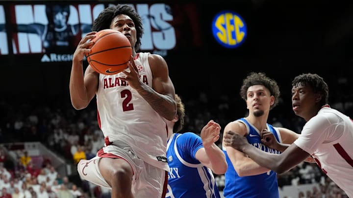 Feb 22, 2025; Tuscaloosa, AL, USA; Alabama guard Aden Holloway (2) drives to the basket at Coleman Coliseum. Alabama defeated Kentucky 96-83. Mandatory Credit: Gary Cosby Jr.-Tuscaloosa News