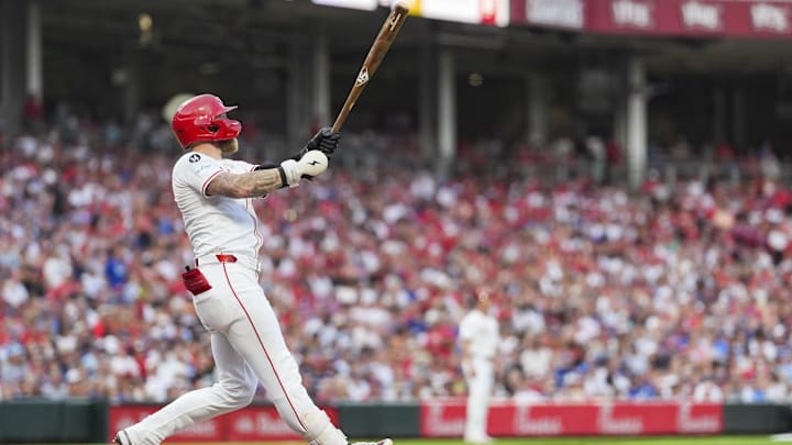 Jul 29, 2025; Cincinnati, Ohio, USA;  Cincinnati Reds outfielder Jake Fraley (27) watches his two-run home run against the Los Angeles Dodgers in the fourth inning at Great American Ball Park. Mandatory Credit: Aaron Doster-Imagn Images
