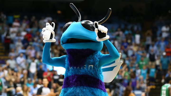 Sep 28, 2018; Chapel Hill, NC, USA; The Charlotte Hornets mascot Hugo throws t-shirts to the fans during the game against the Boston Celtics at Dean E. Smith Center. Mandatory Credit: Jeremy Brevard-Imagn Images