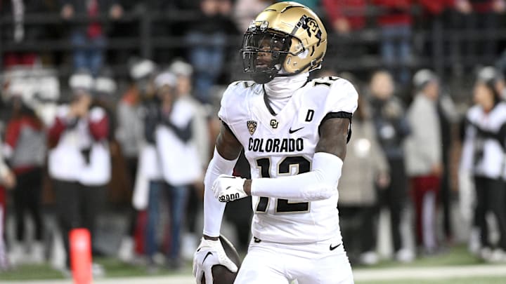 Nov 17, 2023; Pullman, Washington, USA; Colorado Buffaloes cornerback Travis Hunter (12) celebrates a touchdown against the Washington State Cougars in the first half at Gesa Field at Martin Stadium. Mandatory Credit: James Snook-Imagn Images