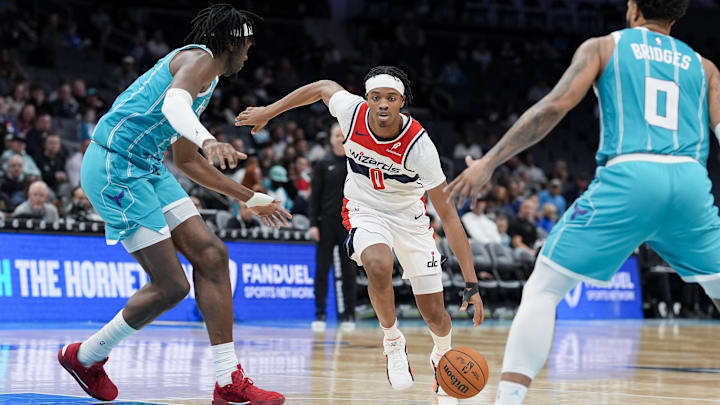 Feb 3, 2025; Charlotte, North Carolina, USA; Washington Wizards guard Bilal Coulibaly (0) drives to the basket against Charlotte Hornets center Mark Williams (5) during the second half at Spectrum Center. Mandatory Credit: Jim Dedmon-Imagn Images Feb 3, 2025; Charlotte, North Carolina, USA; Washington Wizards guard Bilal Coulibaly (0) drives to the basket against Charlotte Hornets center Mark Williams (5) during the second half at Spectrum Center. Mandatory Credit: Jim Dedmon-Imagn Images