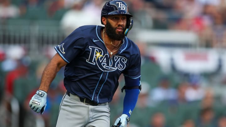Jun 14, 2024; Atlanta, Georgia, USA; Tampa Bay Rays third baseman Amed Rosario (10) hits a RBI double against the Atlanta Braves in the first inning at Truist Park. Mandatory Credit: Brett Davis-USA TODAY Sports Jun 14, 2024; Atlanta, Georgia, USA; Tampa Bay Rays third baseman Amed Rosario (10) hits a RBI double against the Atlanta Braves in the first inning at Truist Park. Mandatory Credit: Brett Davis-USA TODAY Sports