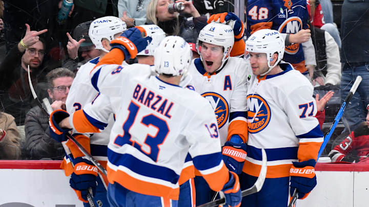 Feb 5, 2026; Newark, New Jersey, USA; New York Islanders center Bo Horvat (14) celebrates with teammates after scoring against the New Jersey Devils during the third period at Prudential Center. Mandatory Credit: John Jones-Imagn Images Feb 5, 2026; Newark, New Jersey, USA; New York Islanders center Bo Horvat (14) celebrates with teammates after scoring against the New Jersey Devils during the third period at Prudential Center. Mandatory Credit: John Jones-Imagn Images