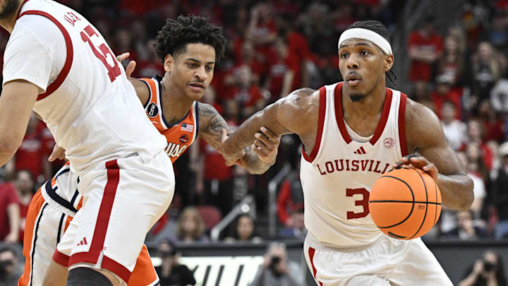 Mar 3, 2026; Louisville, Kentucky, USA;  Louisville Cardinals guard Ryan Conwell (3) dribbles against Syracuse Orange forward Kiyan Anthony (7) during the second half at KFC Yum! Center. Louisville defeated Syracuse 77-62. Mandatory Credit: Jamie Rhodes-Imagn Images