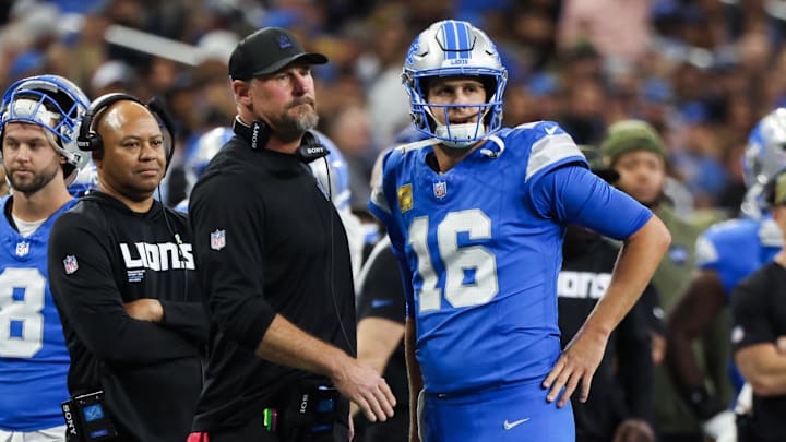 Nov 2, 2025; Detroit, Michigan, USA; Detroit Lions quarterback Jared Goff (16) speaks with head coach Dan Campbell in the first half against the Minnesota Vikings at Ford Field. Mandatory Credit: David Reginek-Imagn Images