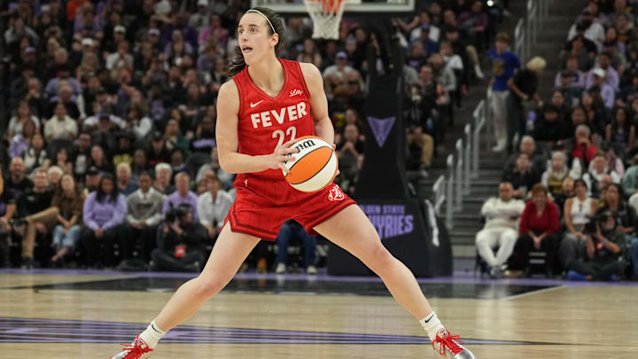 Jun 19, 2025; San Francisco, California, USA; Indiana Fever guard Caitlin Clark (22) handles the ball against the Golden State Valkyries during the fourth quarter at Chase Center. Mandatory Credit: Darren Yamashita-Imagn Images