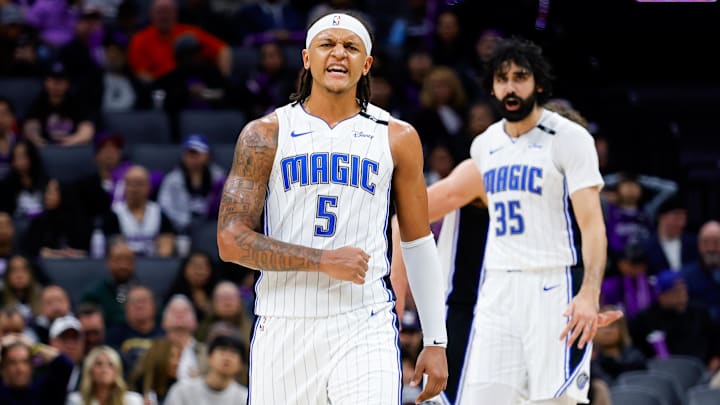Feb 5, 2025; Sacramento, California, USA; Orlando Magic forward Paolo Banchero (5) celebrates after a basket during the third quarter against the Sacramento Kings at Golden 1 Center. Mandatory Credit: Sergio Estrada-Imagn Images