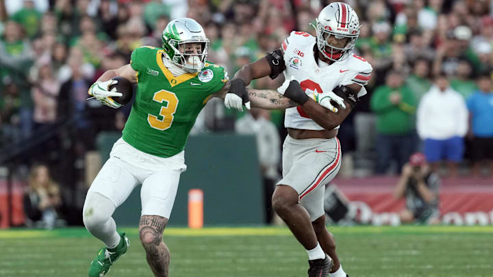 Jan 1, 2025; Pasadena, CA, USA; Oregon Ducks tight end Terrance Ferguson (3) runs against Ohio State Buckeyes safety Sonny Styles (6) in the third quarter in the 2025 Rose Bowl college football quarterfinal game at Rose Bowl Stadium. Jan 1, 2025; Pasadena, CA, USA; Oregon Ducks tight end Terrance Ferguson (3) runs against Ohio State Buckeyes safety Sonny Styles (6) in the third quarter in the 2025 Rose Bowl college football quarterfinal game at Rose Bowl Stadium.