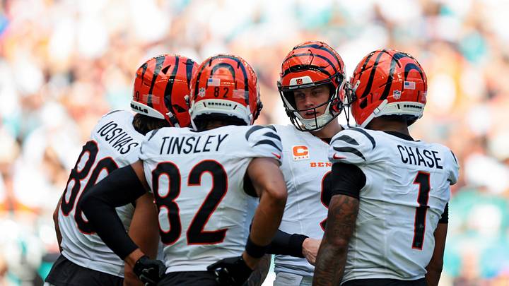 Dec 21, 2025; Miami Gardens, Florida, USA; Cincinnati Bengals quarterback Joe Burrow (9) talks to his teammates Cincinnati Bengals tight end Mike Gesicki (88), Cincinnati Bengals wide receiver Mitchell Tinsley (82) and Cincinnati Bengals wide receiver Ja'Marr Chase (1) after a play during the second quarter against the Miami Dolphins at Hard Rock Stadium. Mandatory Credit: Sam Navarro-Imagn Images Dec 21, 2025; Miami Gardens, Florida, USA; Cincinnati Bengals quarterback Joe Burrow (9) talks to his teammates Cincinnati Bengals tight end Mike Gesicki (88), Cincinnati Bengals wide receiver Mitchell Tinsley (82) and Cincinnati Bengals wide receiver Ja'Marr Chase (1) after a play during the second quarter against the Miami Dolphins at Hard Rock Stadium. Mandatory Credit: Sam Navarro-Imagn Images