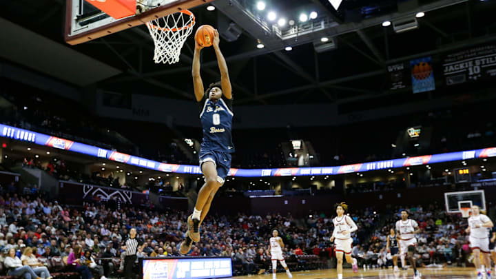 St. John Bosco's Brandon McCoy Jr. dunks the ball as the Braves take on the Central Bulldogs during the 39th Annual Bass Pro Shops Tournament of Champions at Great Southern Bank Arena on Thursday, Jan. 11, 2024.