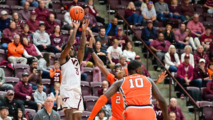 Mar 1, 2025; Blacksburg, Virginia, USA; Virginia Tech Hokies guard Jaydon Young (3) shoots a three point shot as Syracuse Orange guard J.J. Starling (2) defends during the second half at Cassell Coliseum. Mandatory Credit: Brian Bishop-Imagn Images Mar 1, 2025; Blacksburg, Virginia, USA; Virginia Tech Hokies guard Jaydon Young (3) shoots a three point shot as Syracuse Orange guard J.J. Starling (2) defends during the second half at Cassell Coliseum. Mandatory Credit: Brian Bishop-Imagn Images