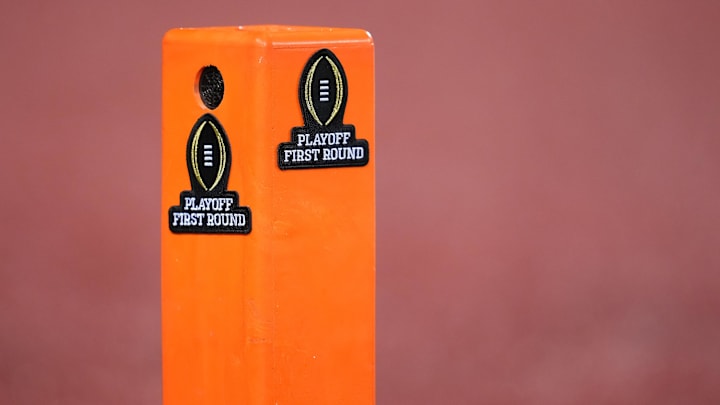 A pylon features College Football Playoff logos A pylon features College Football Playoff logos