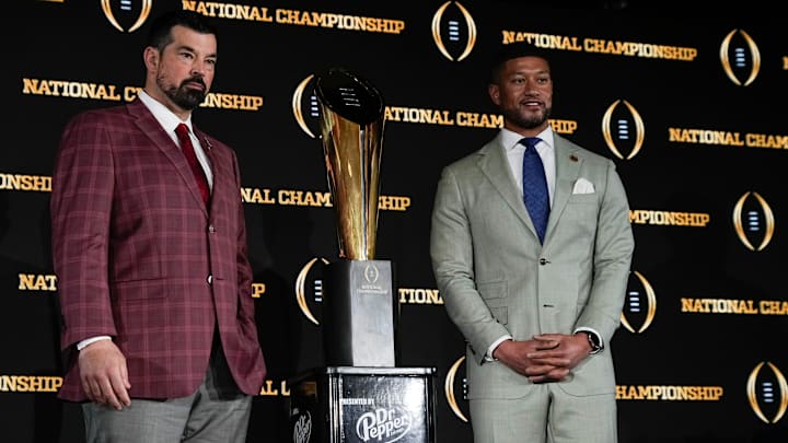 Ohio State coach Ryan Day and Notre Dame coach Marcus Freeman pose together before their College Football Playoff championship matchup.
