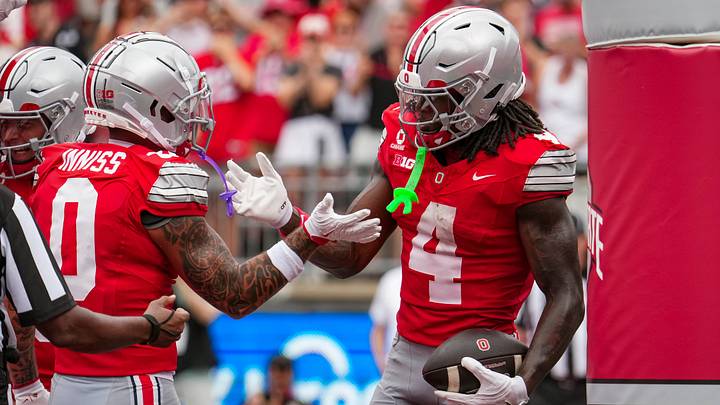 Ohio State Buckeyes wide receiver Jeremiah Smith (4) celebrates a touchdown with wide receiver Brandon Inniss (0) during the NCAA football game against the Ball State Cardinals at Ohio Stadium in Columbus on Sept. 5, 2026. Ohio State Buckeyes wide receiver Jeremiah Smith (4) celebrates a touchdown with wide receiver Brandon Inniss (0) during the NCAA football game against the Ball State Cardinals at Ohio Stadium in Columbus on Sept. 5, 2026.