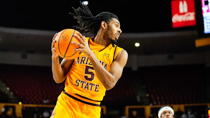 Amier Ali grabs a rebound for Arizona State