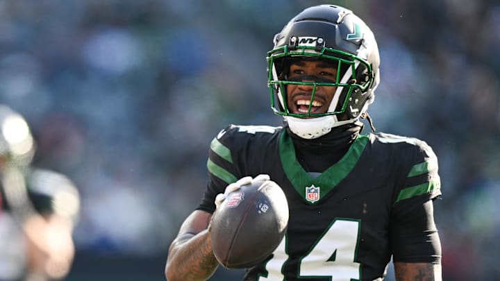 Dec 1, 2024; East Rutherford, New Jersey, USA; New York Jets wide receiver Malachi Corley (14) celebrates after a play during the first quarter against the Seattle Seahawks at MetLife Stadium. Mandatory Credit: Mark Smith-Imagn Images