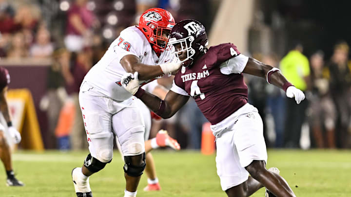 Sep 2, 2023; College Station, Texas, USA; Texas A&M Aggies defensive lineman Shemar Stewart (4) breaks past New Mexico Lobos offensive lineman Matthew Toilolo (74) during the fourth quarter at Kyle Field.