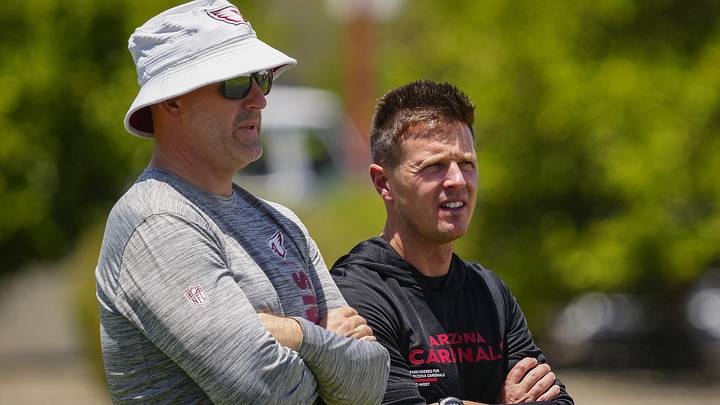 Arizona Cardinals general manager Monti Ossenfort (left) talks with head coach Mike LaFleur during organized team activities at the Cardinals Training Facility in Tempe on May 27, 2026. Arizona Cardinals general manager Monti Ossenfort (left) talks with head coach Mike LaFleur during organized team activities at the Cardinals Training Facility in Tempe on May 27, 2026.