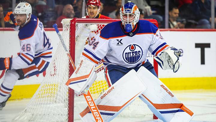 Sep 21, 2025; Calgary, Alberta, CAN; Edmonton Oilers goaltender Samuel Jonsson (34) guards his net against the Calgary Flames during the second period at Scotiabank Saddledome. Mandatory Credit: Sergei Belski-Imagn Images Sep 21, 2025; Calgary, Alberta, CAN; Edmonton Oilers goaltender Samuel Jonsson (34) guards his net against the Calgary Flames during the second period at Scotiabank Saddledome. Mandatory Credit: Sergei Belski-Imagn Images