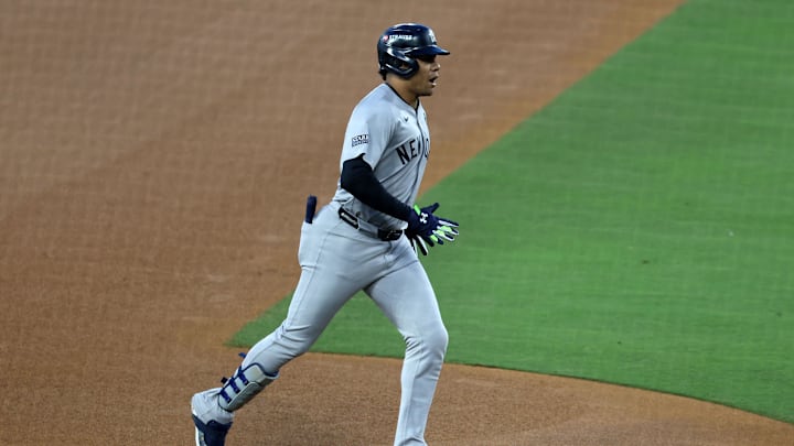Oct 26, 2024; Los Angeles, California, USA; New York Yankees outfielder Juan Soto (22) rounds the bases after hitting a home run against the Los Angeles Dodgers in the third inning for game two of the 2024 MLB World Series at Dodger Stadium. Mandatory Credit: Kiyoshi Mio-Imagn Images
