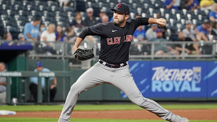 Aug 31, 2021: Cleveland Indians relief pitcher Alex Young (46) delivers against the Kansas City Royals in the ninth inning at Kauffman Stadium.
