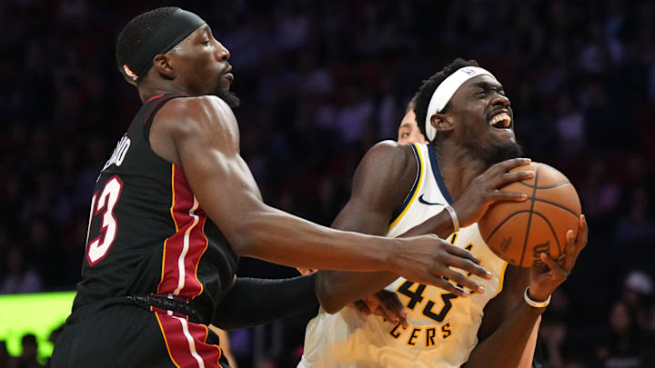 Jan 2, 2025; Miami, Florida, USA;  Indiana Pacers forward Pascal Siakam (43) goes up for a shot past Miami Heat center Bam Adebayo (13) during the first half at Kaseya Center. Mandatory Credit: Jim Rassol-Imagn Images