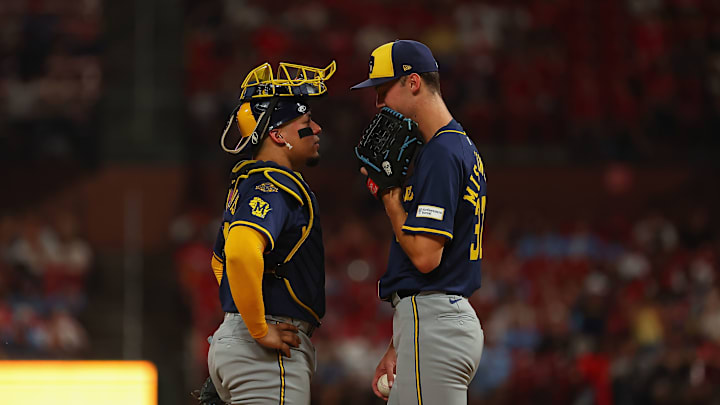 Milwaukee Brewers catcher William Contreras and pitcher Jacob Misiorowski converse against the St. Louis Cardinals.