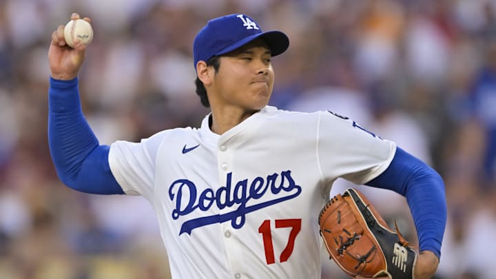 Jun 16, 2025; Los Angeles, California, USA; Los Angeles Dodgers designated hitter Shohei Ohtani (17) throws against the San Diego Padres during the first inning at Dodger Stadium. Mandatory Credit: Jayne Kamin-Oncea-Imagn Images