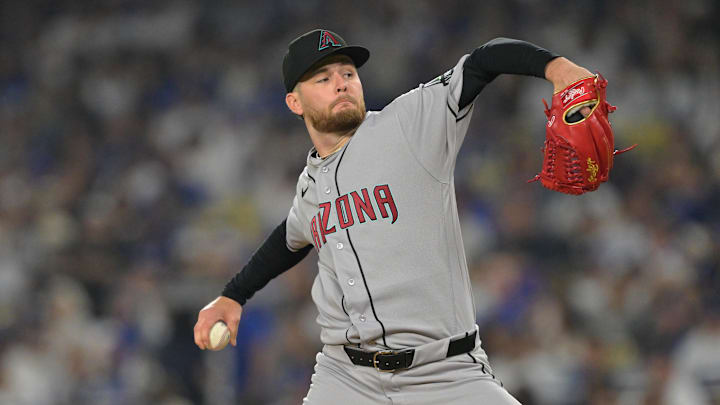 Mar 27, 2026; Los Angeles, California, USA;  Arizona Diamondbacks pitcher Ryne Nelson (19) pitches against the Los Angeles Dodgers in the second inning at Dodger Stadium. Mandatory Credit: Jayne Kamin-Oncea-Imagn Images