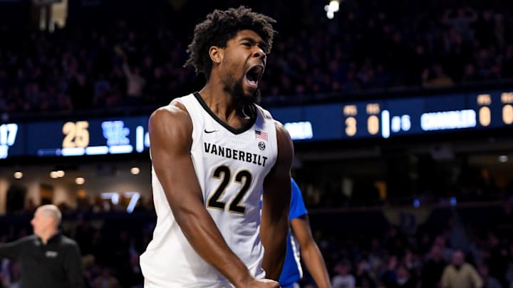 Jan 25, 2025; Nashville, Tennessee, USA;  Vanderbilt Commodores forward Jaylen Carey (22) celebrates his slam dunk against the Kentucky Wildcats.during the first half at Memorial Gymnasium. Mandatory Credit: Steve Roberts-Imagn Images