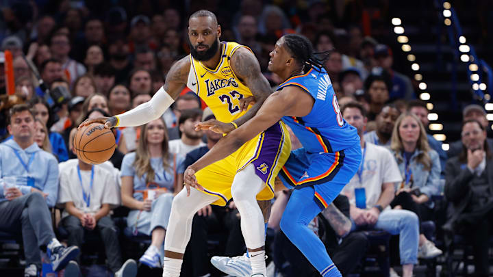 Apr 8, 2025; Oklahoma City, Oklahoma, USA; Oklahoma City Thunder forward Jalen Williams (8) defends Los Angeles Lakers forward LeBron James (23) during the second half at Paycom Center.