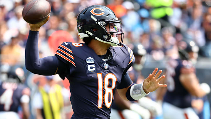 Sep 8, 2024; Chicago, Illinois, USA; Chicago Bears quarterback Caleb Williams (18) drops back to pass against the Tennessee Titans during the second quarter at Soldier Field. Mandatory Credit: Mike Dinovo-Imagn Images